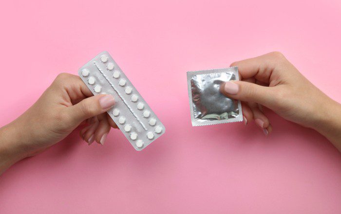picture of condom and oral contraceptive pill used for contraception